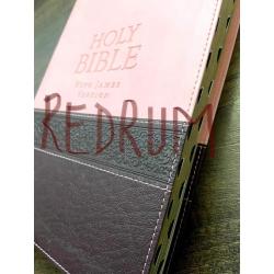 Hope Warvi pink prison Bible signed in red ink from 2021