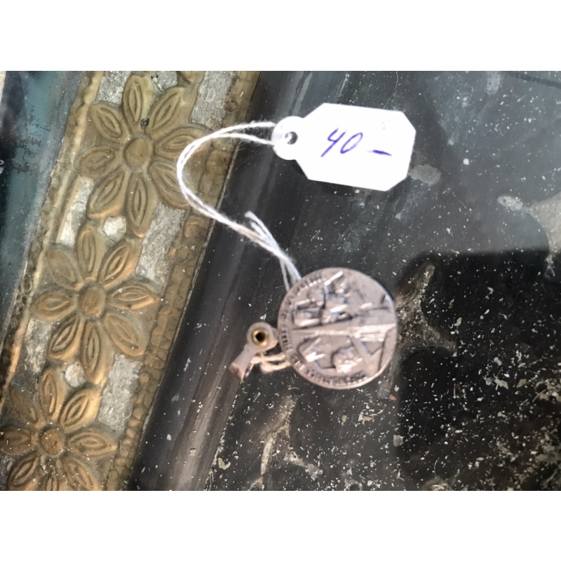 Saint Marie Louise Trichet original relic in a medallion that opens up showing a piece of clothing with her blood