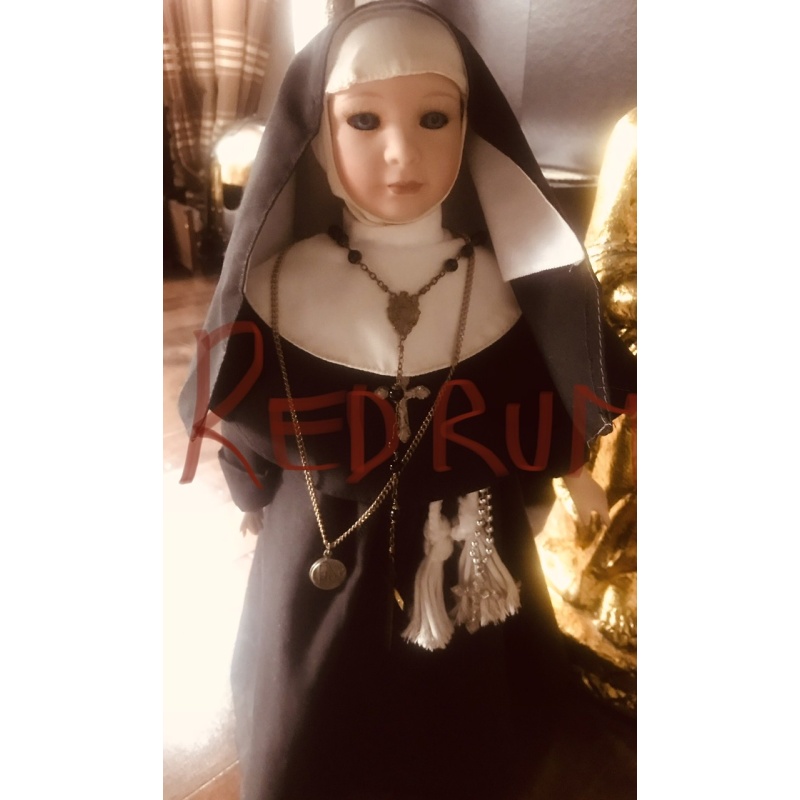 Evil Nun 16 inch. doll fully dressed with numerous relics